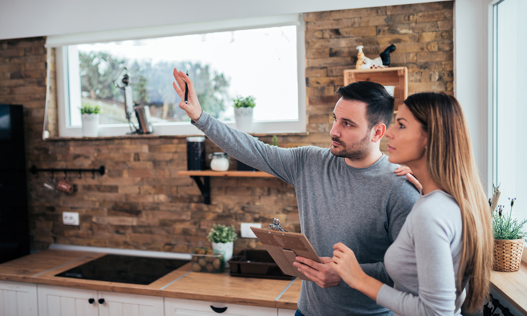 couple talking about kitchen